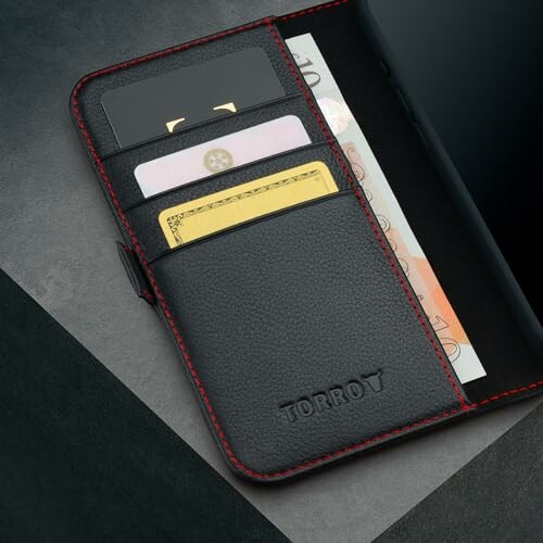 Black leather phone wallet case with cards and currency.