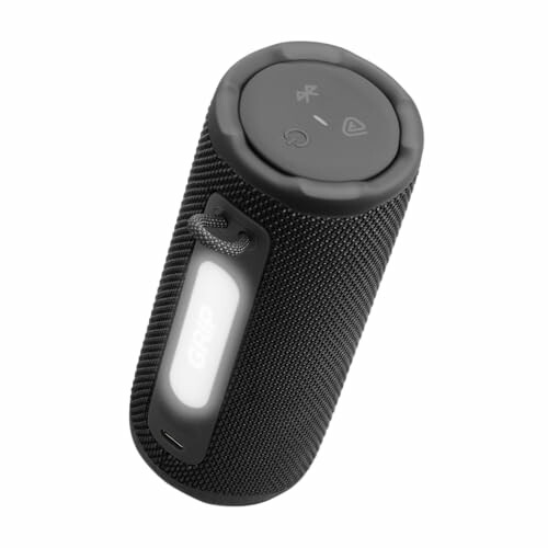 Black portable Bluetooth speaker with control buttons.